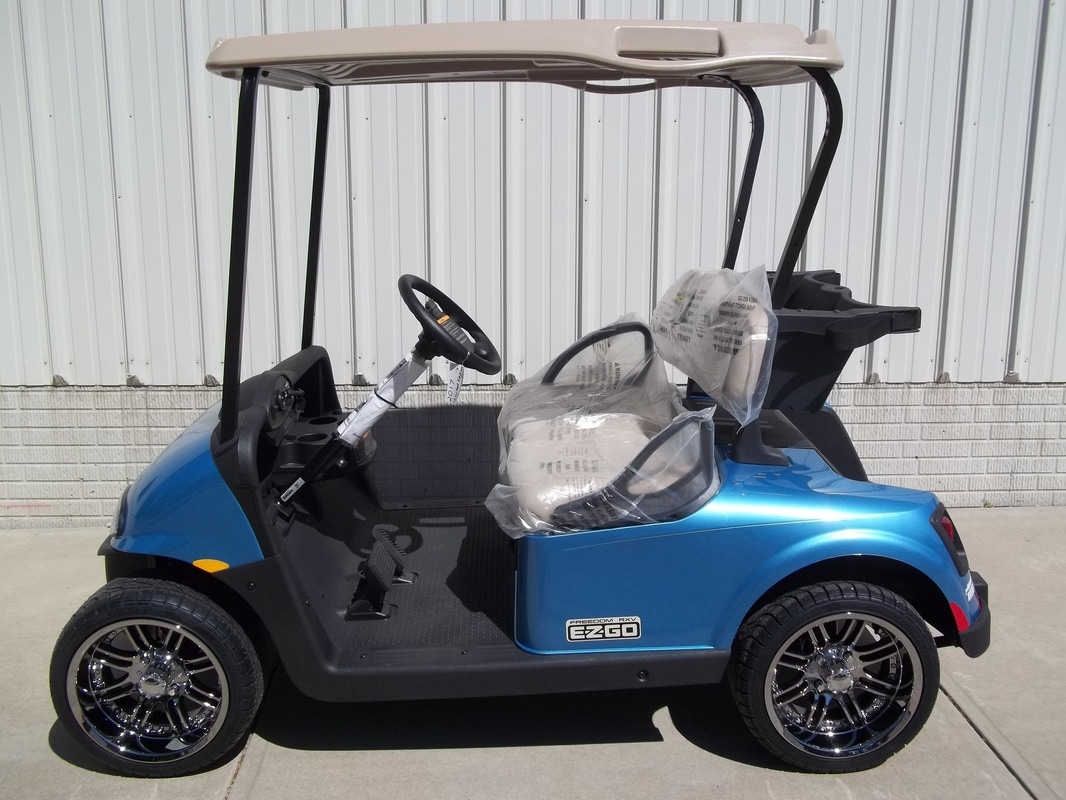 2017 E-Z-GO RXV Electric 48volt Kinetic Blue Limited Edition 14 inch wheels New Stone Beige Seats & Top Freedom Lights