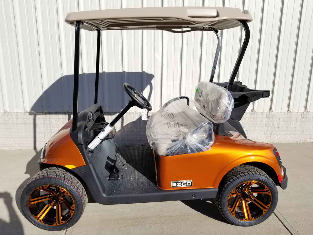 2018 E-Z-GO RXV ELiTE 2.0 NEW Sunburst Orange, Stone Beige Seats & Top, Electric 2.0 Samsung Lithium Ion Batteries (5-Year Free Replacement on Batteries), Freedom (Includes Head-Tail-Brake Lights, Horn, State of Charge Meter, 19.5 MPH), 14